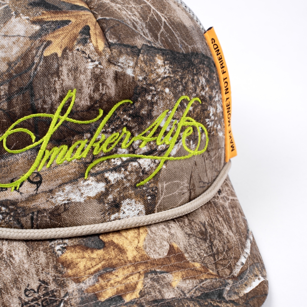 $4L TRUCK HAT IN TREE CAMO