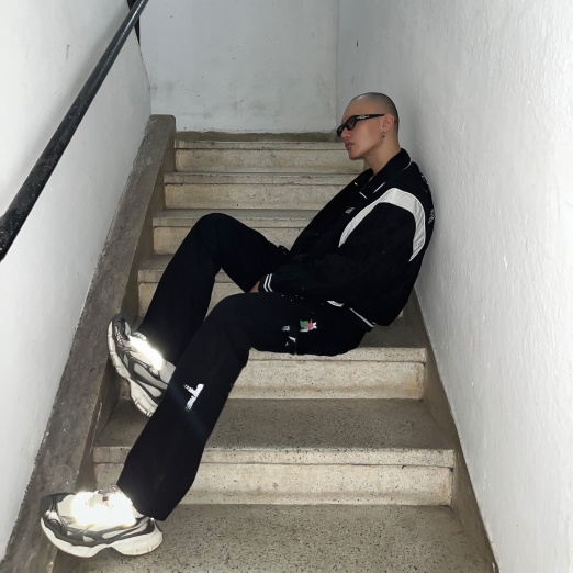 SPLASHED FLARE JEANS IN BLACK