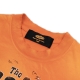 THE $MAKER COWBOYS WASHED TEE IN ORANGE